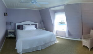 The Harbor Suite -- The Harbor Suite at the Grey Havens Inn is an oceanfront room with a queen bed, private bath, and a lovely ocean view.