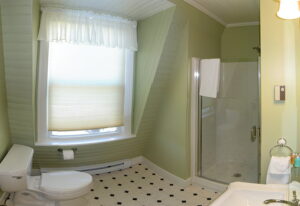 The Oak Room Bath -- The Oak Room has a private bath with shower.
