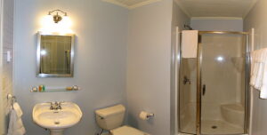 The Tides Room Bath -- Private bath with shower. The Tides at Grey Havens.