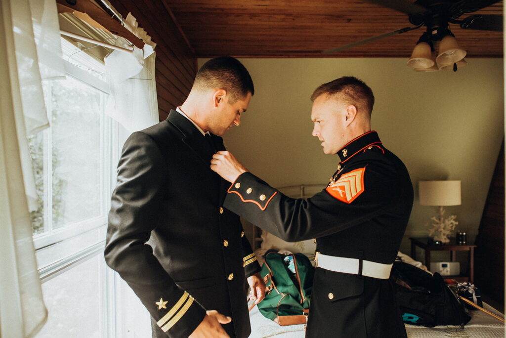 two men getting ready for wedding