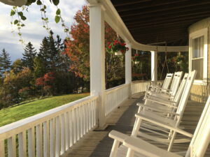 Porch of Grey Havens Inn with Rocking Chairs